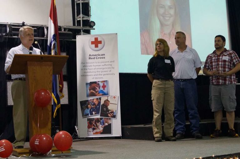Being presented a Red Cross award
