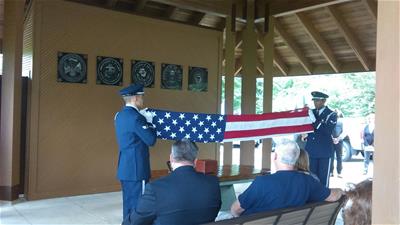 A veteran being laid to rest with full military honors.