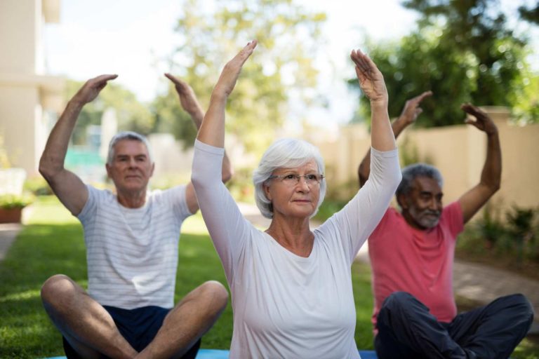 Seniors doing yoga