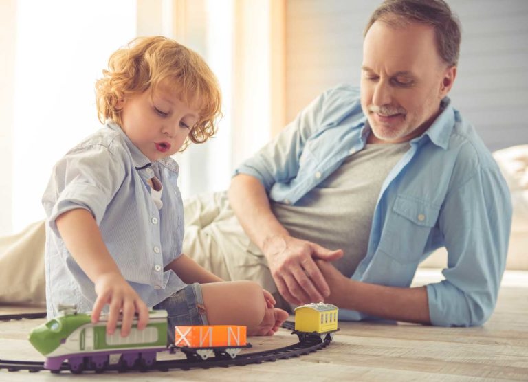 Father and son playing together