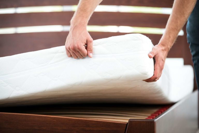 Person laying down mattress