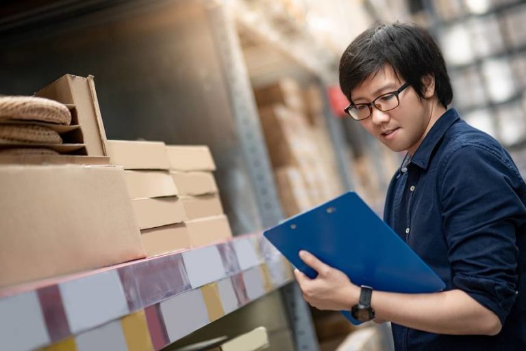 Man counting inventory