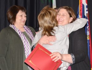 Betsy Berry accepting a Red Cross hero award.