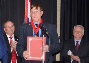 Red Cross hero receiving an award.