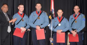 Red Cross heroes receiving an award.