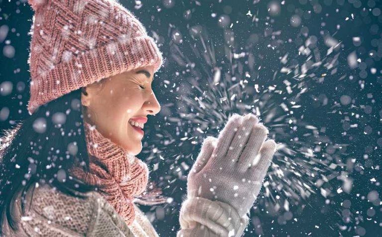 Lady playing in the snow