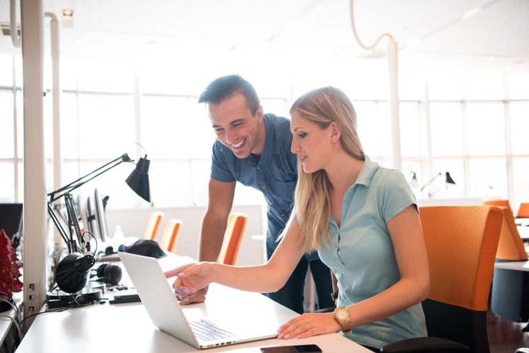 two coworkers working together