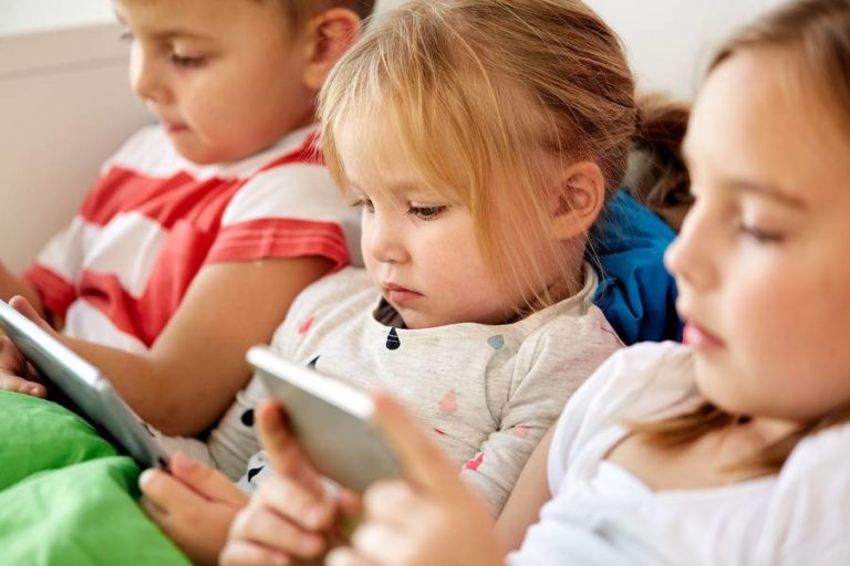 Kids enjoying screen time together