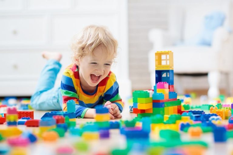 Kid playing with toys