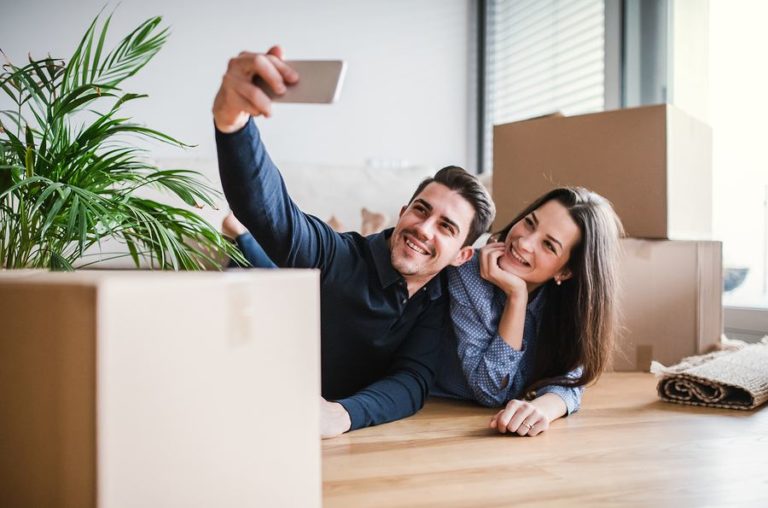 Couple takes selfie in new home