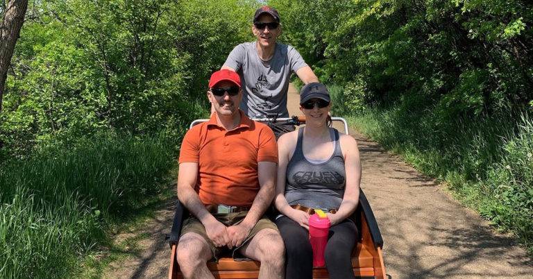 People posing on outdoor trail