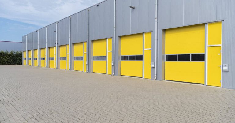 Exterior shot of a large commercial warehouse.