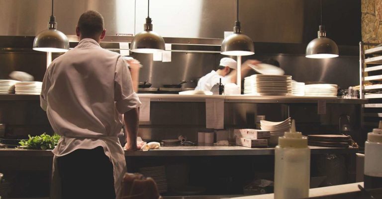 Restaurant kitchen with employees