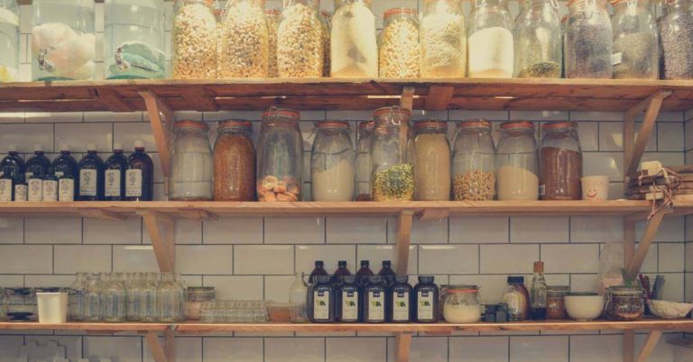 Wall lined up with various cooking supplies