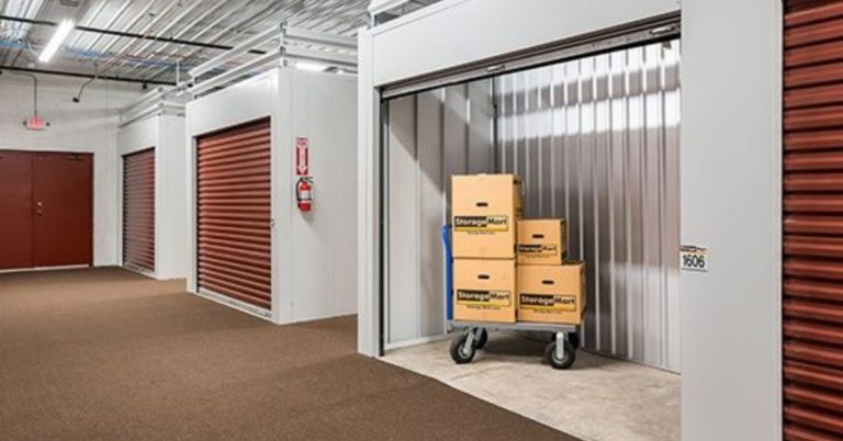 StorageMart boxes in a small indoor unit
