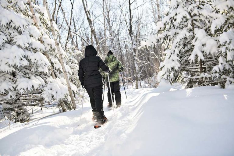 Two people hiking in snow