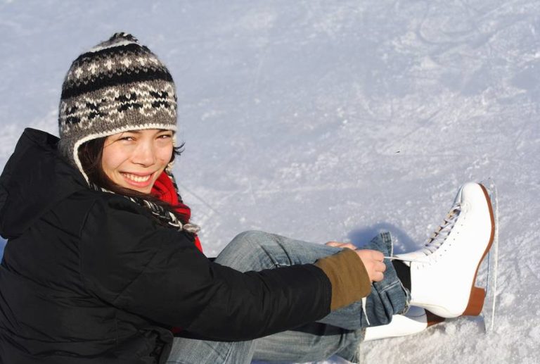 Lady slipping on ice skate