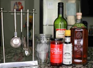 drink recipe ingredients and tools set on a counter