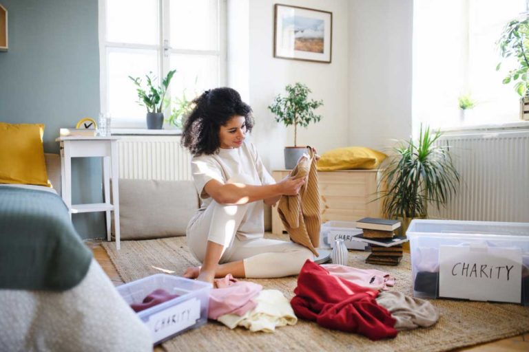 Lady organizing bedroom